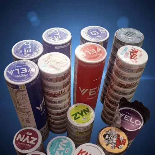 Comparison of Pablo, ZYN, and VELO nicotine pouches showing cans and strengths